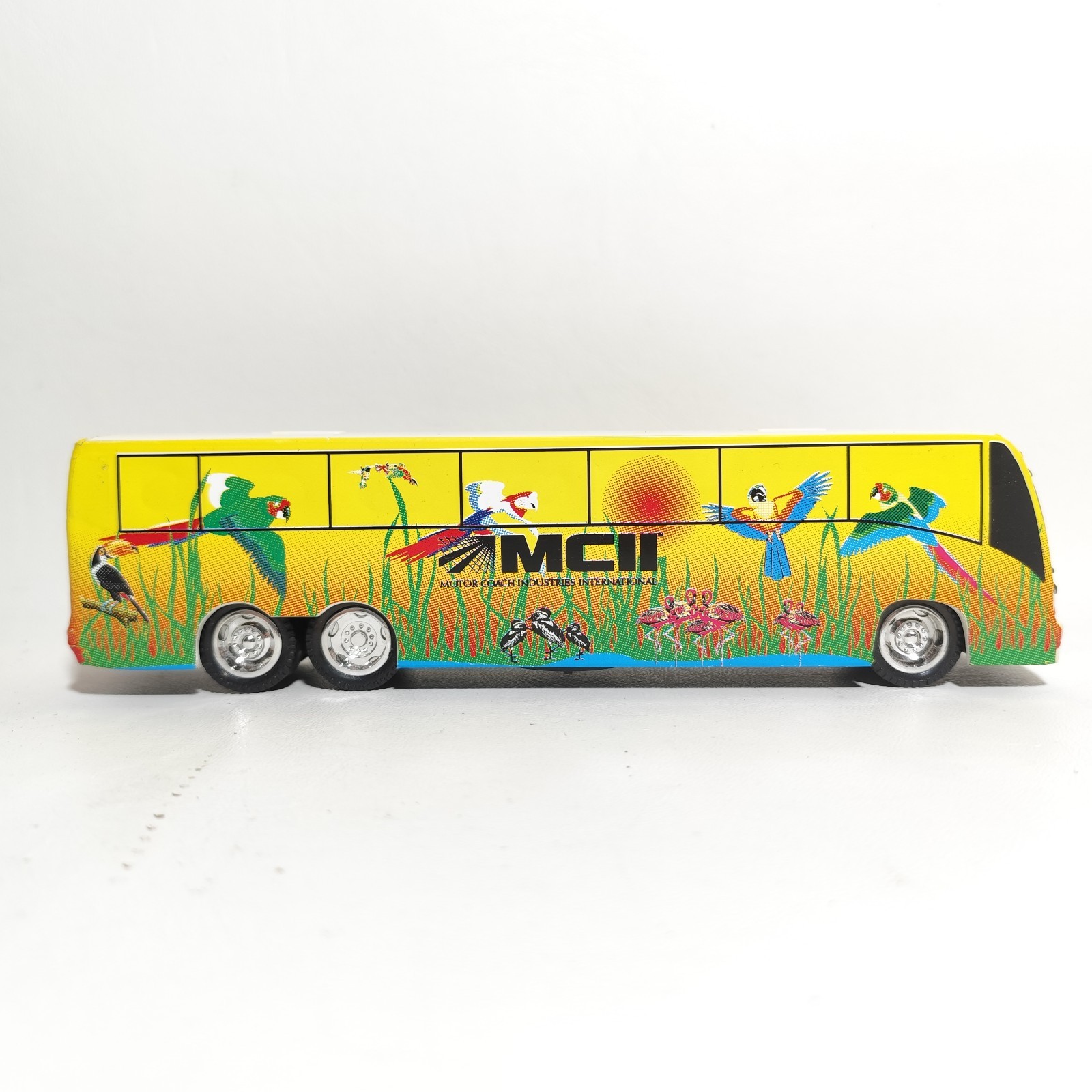 MCII Motor Coach Industries Universal Coach UMA 2000 Bus Bank Tropical Birds