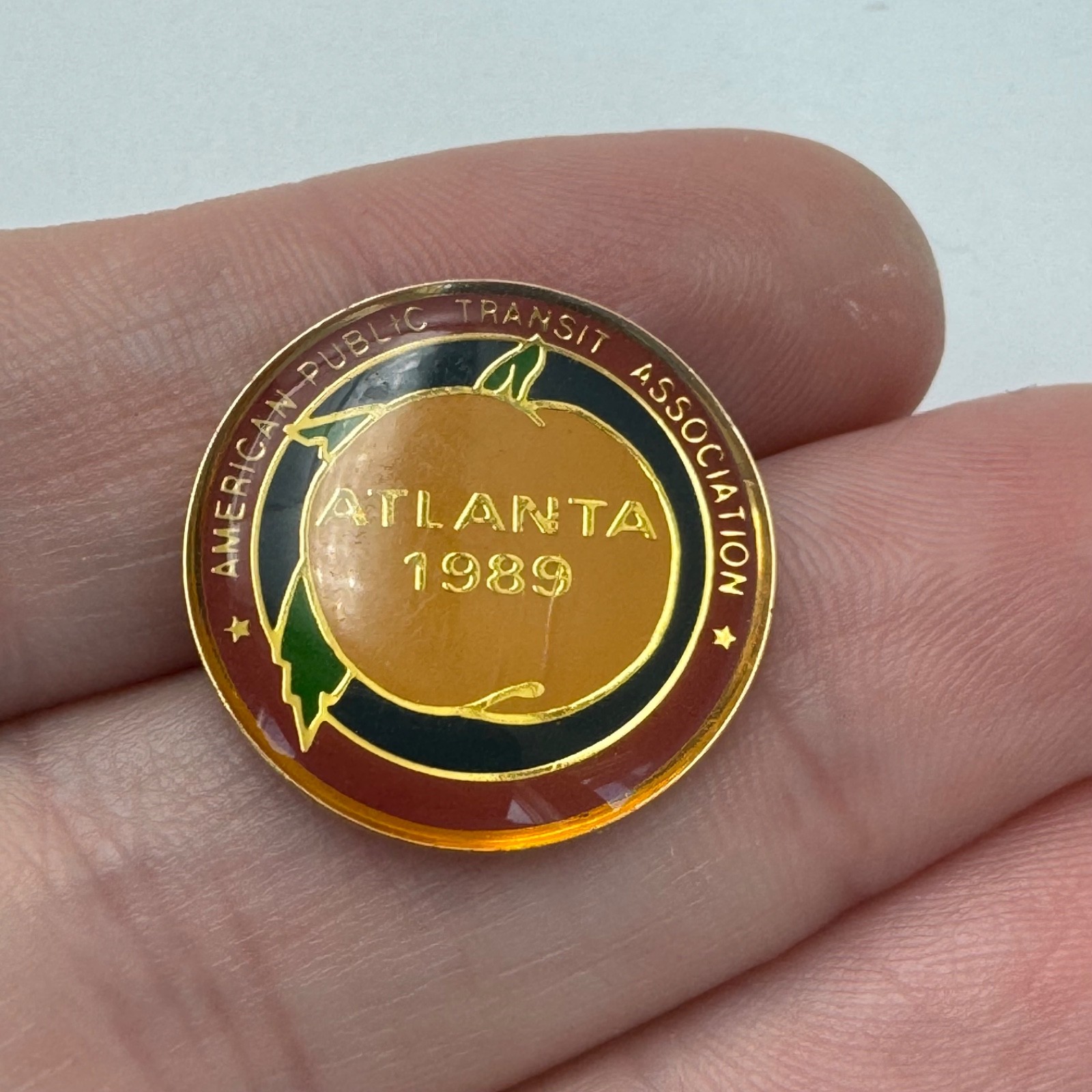 1989 American Public Transit Association Lapel Pin Atlanta Peach APTA