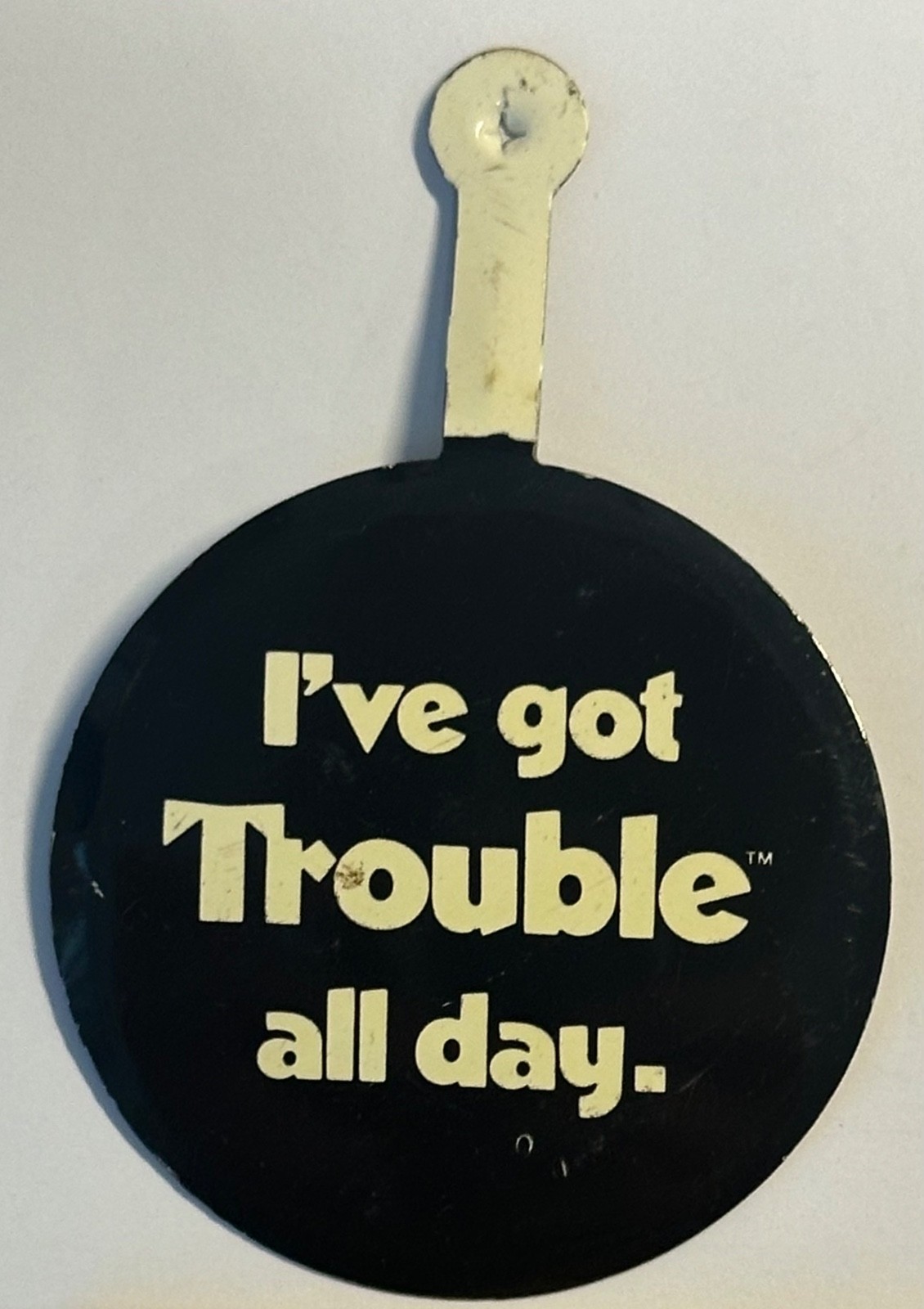 Vintage “I’ve Got Trouble All Day” Tin Tab Pin – Funny Slogan Pocket Hanger