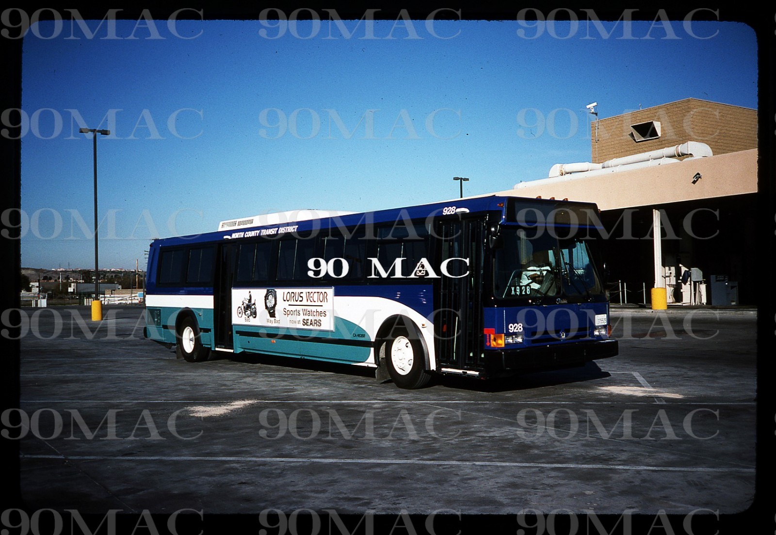 NCTD. FLXIBLE METRO BUS #928. Oceanside (CA). Original Slide 1993. (A)