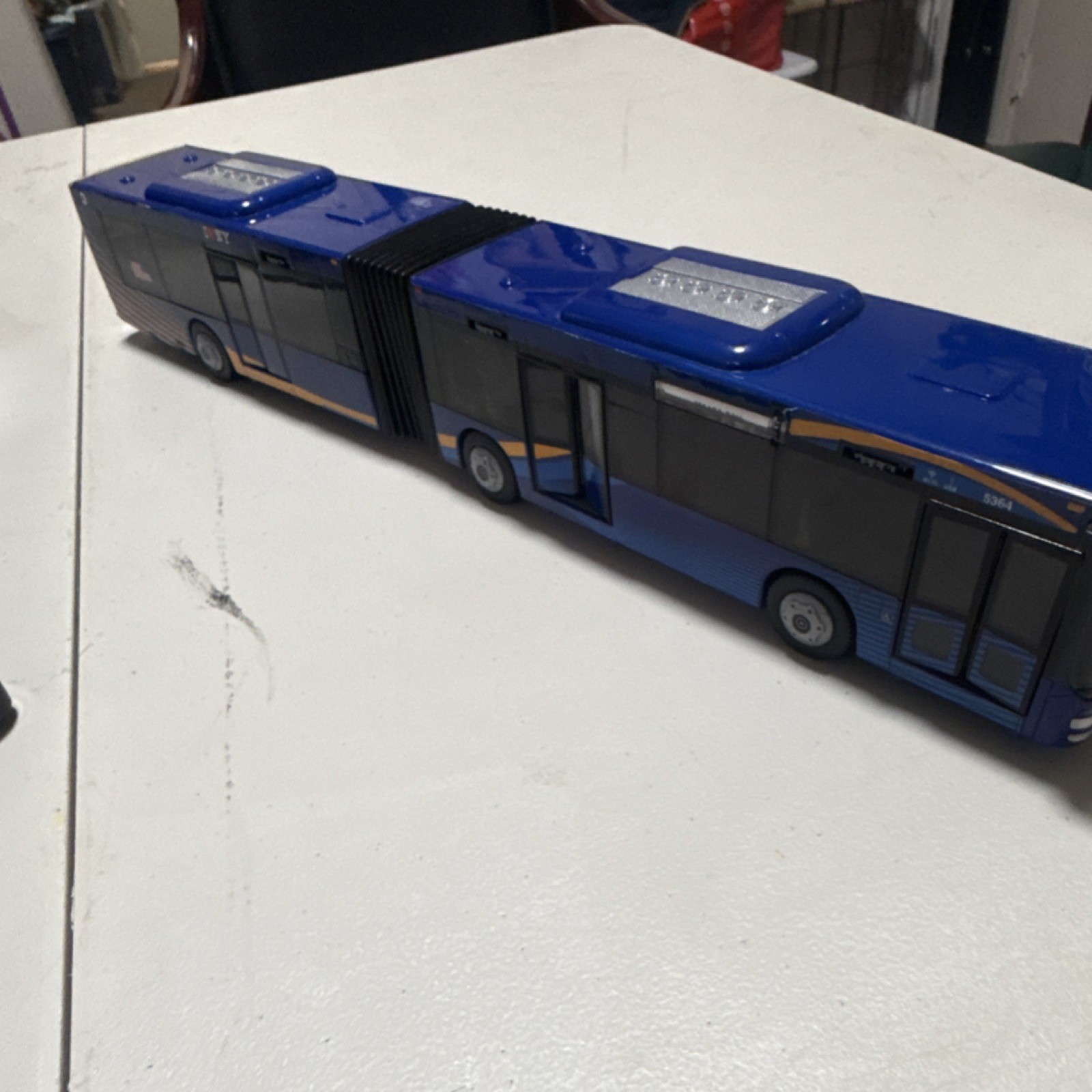 MTA Articulated Bus Model M1 via 5th Ave Blue/Yellow 5364 210611 Collectible