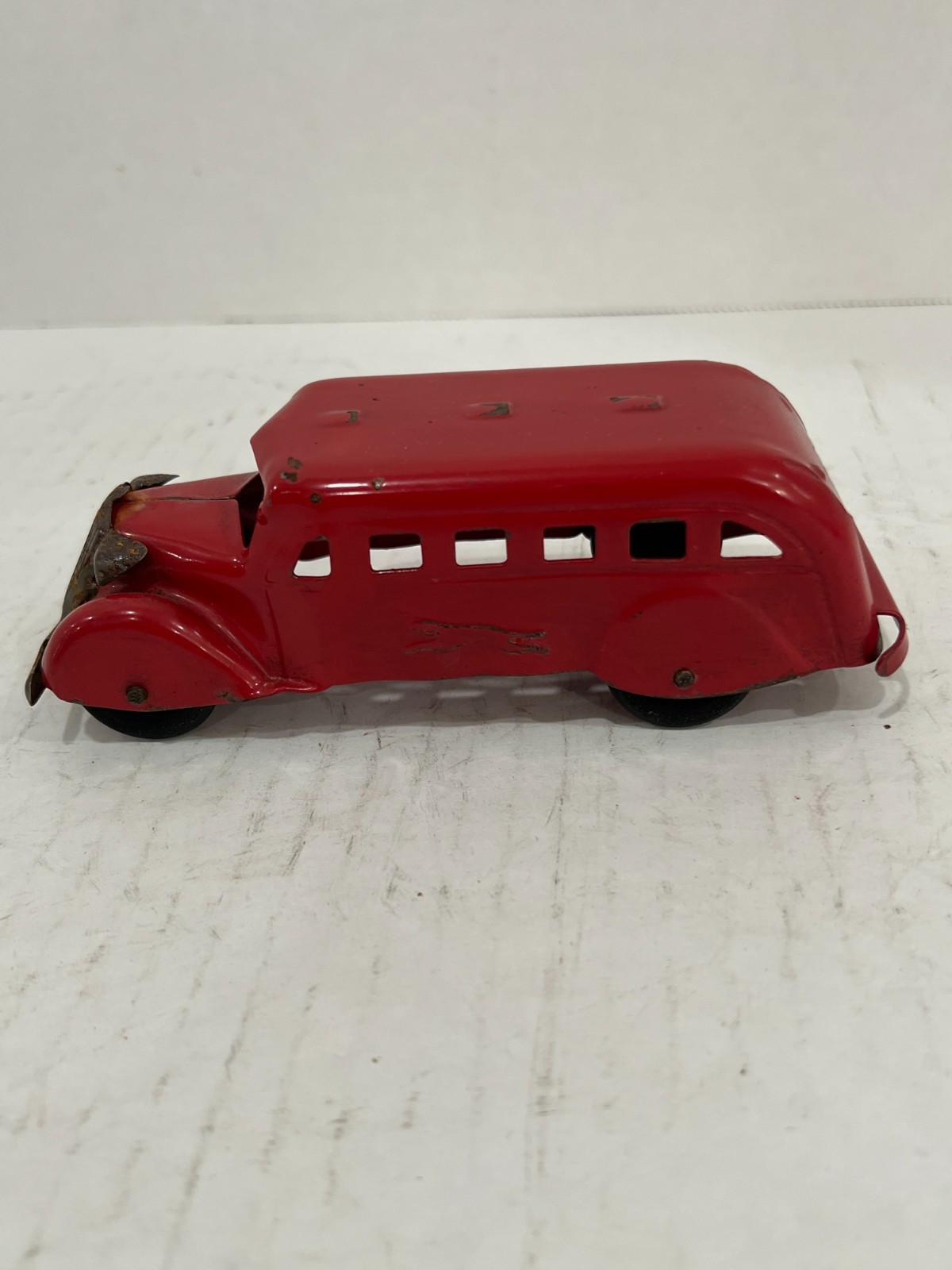 VINTAGE 30’S PRESSED STEEL WOOD WHEEL RED GREYHOUND BUS EMBOSSED GREYHOUND WOW