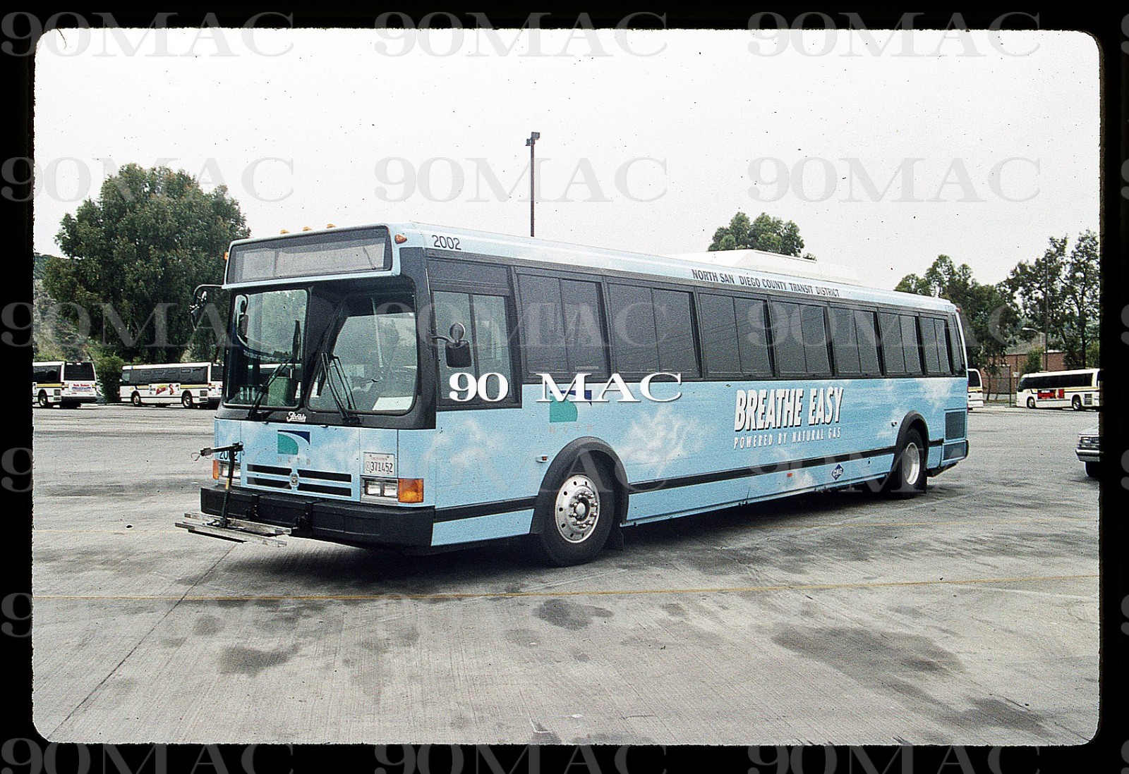 NCTD. FLXIBLE METRO CNG BUS #2002. Oceanside (CA). Original Slide 1993.