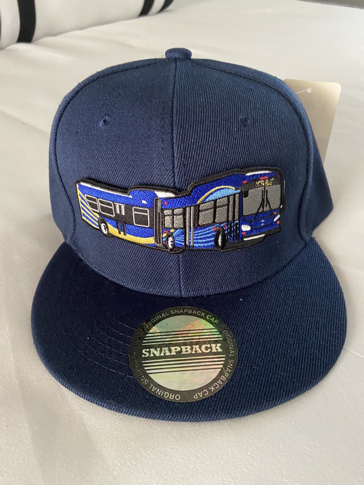 MTA NYCT Aticulate Bus Snapback Cap.