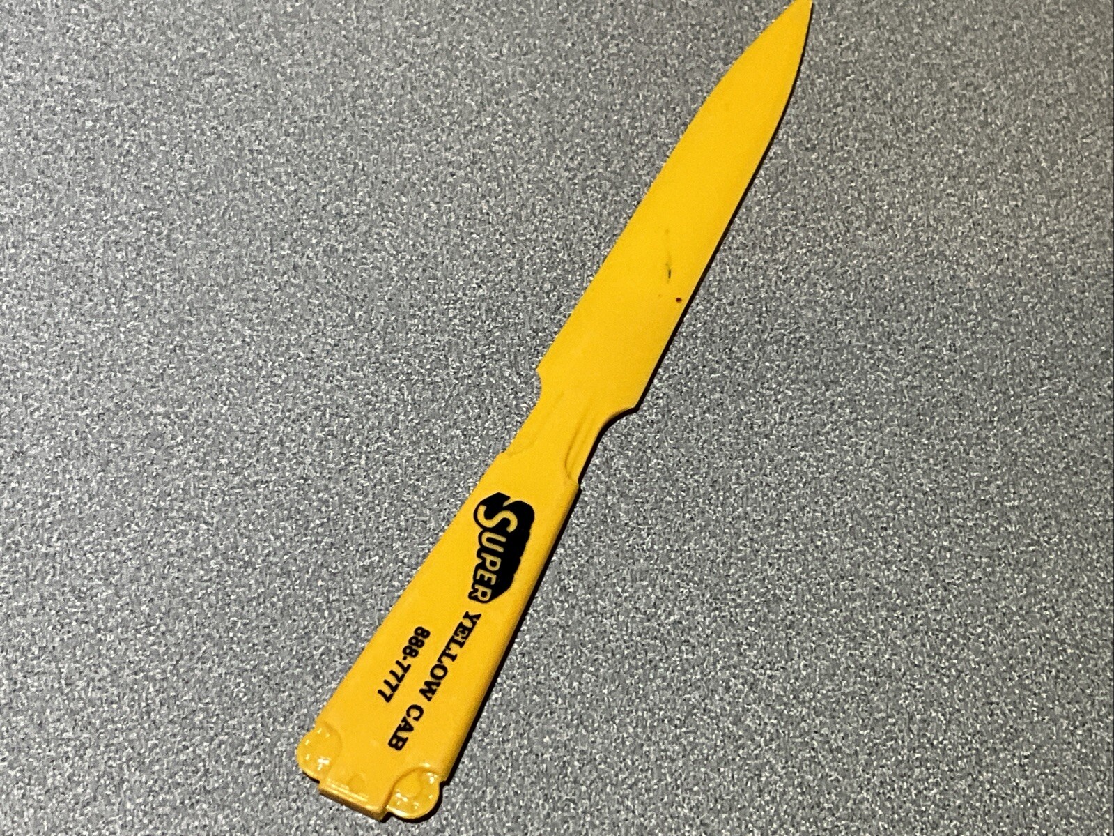 Vintage SUPER YELLOW CAB COMPANY LETTER OPENER MADE IN USA