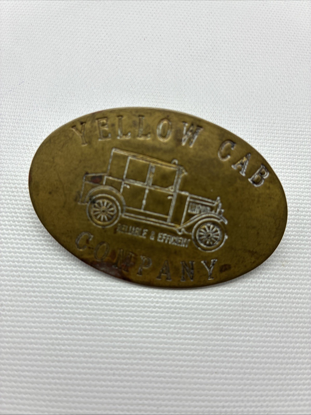 VINTAGE YELLOW CAB COMPANY “RELIABLE & EFFICIENT” BRASS BADGE/PIN