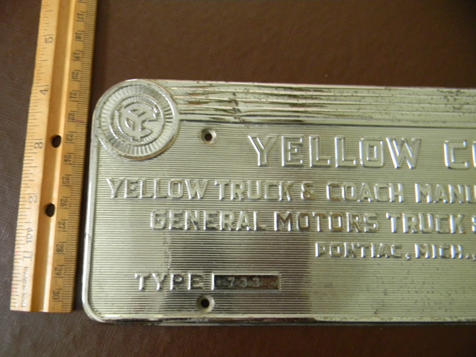 Yellow Coach 733 metal Manufacturer’s Plate from 1930s