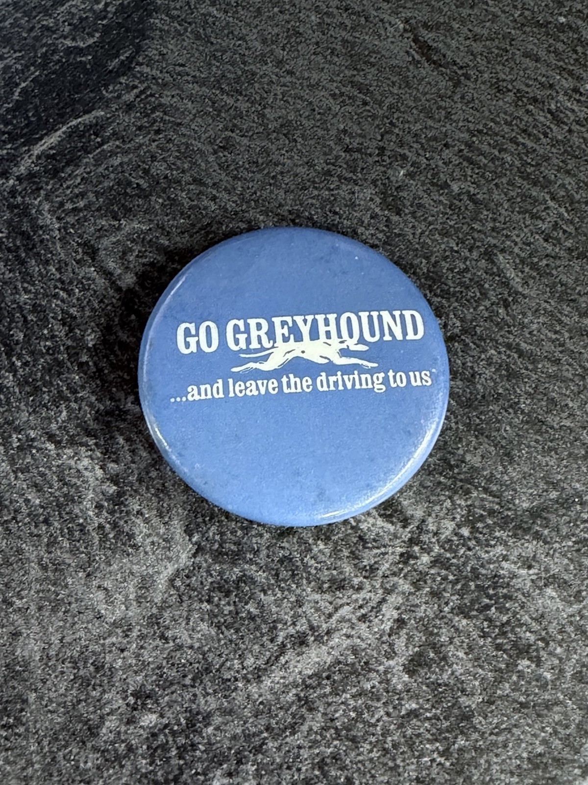 1980s go Greyhound bus lines and leave the Driving to US button 1 3/4”