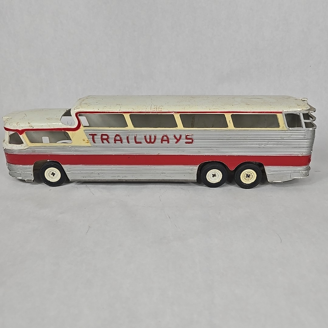 Vintage 1955 Trailways Friction Thruliner Bus Silver and Red 18″