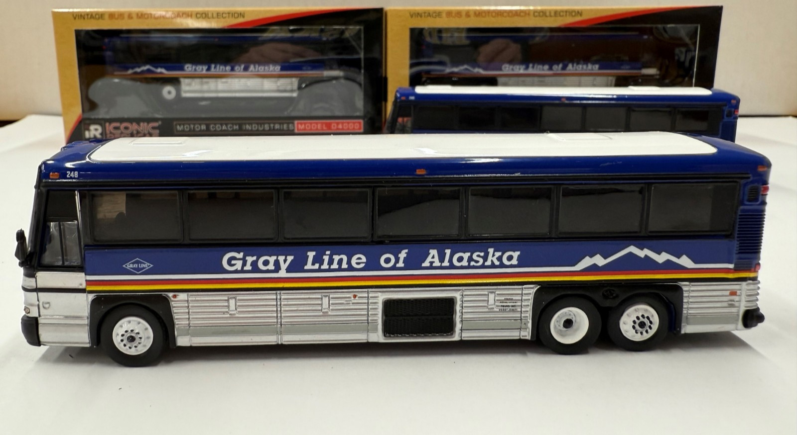 One HO scale Iconic Replicas Gray Line of Alaska MCI D4000 motorcoach