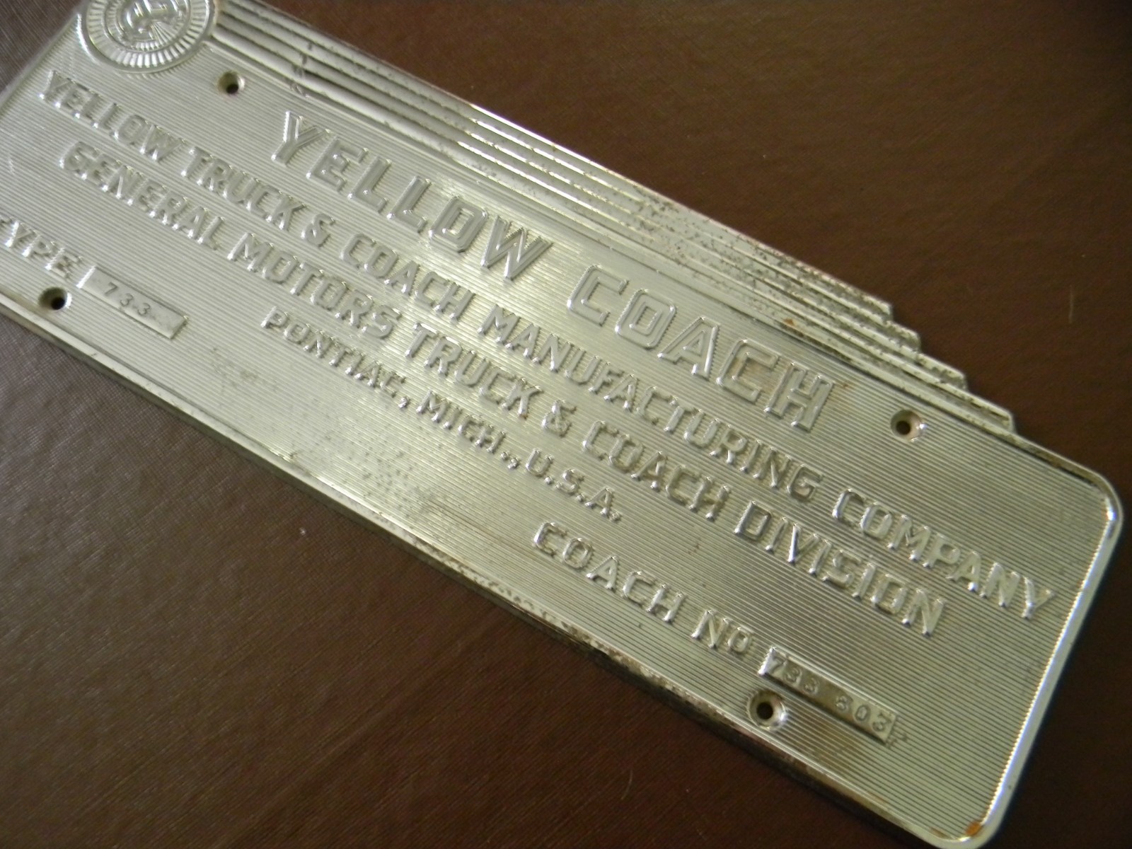 Yellow Coach 733 metal Manufacturer’s Plate from 1930s