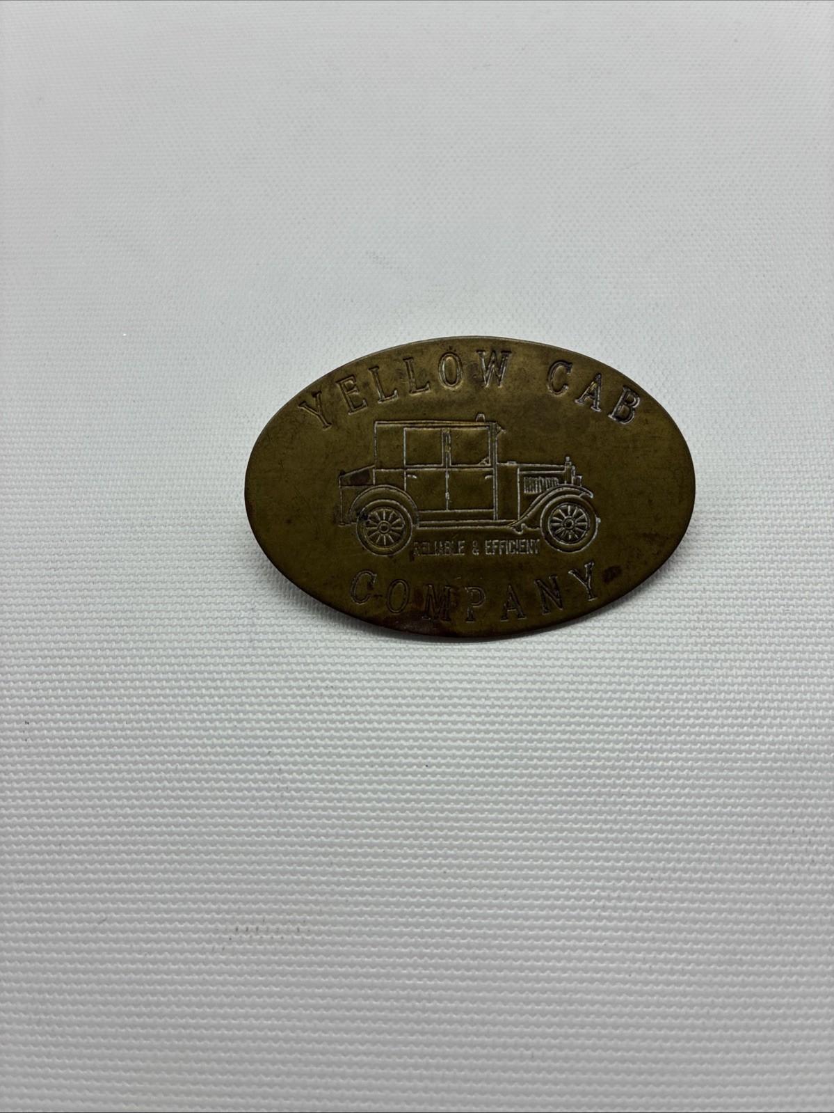 VINTAGE YELLOW CAB COMPANY “RELIABLE & EFFICIENT” BRASS BADGE/PIN