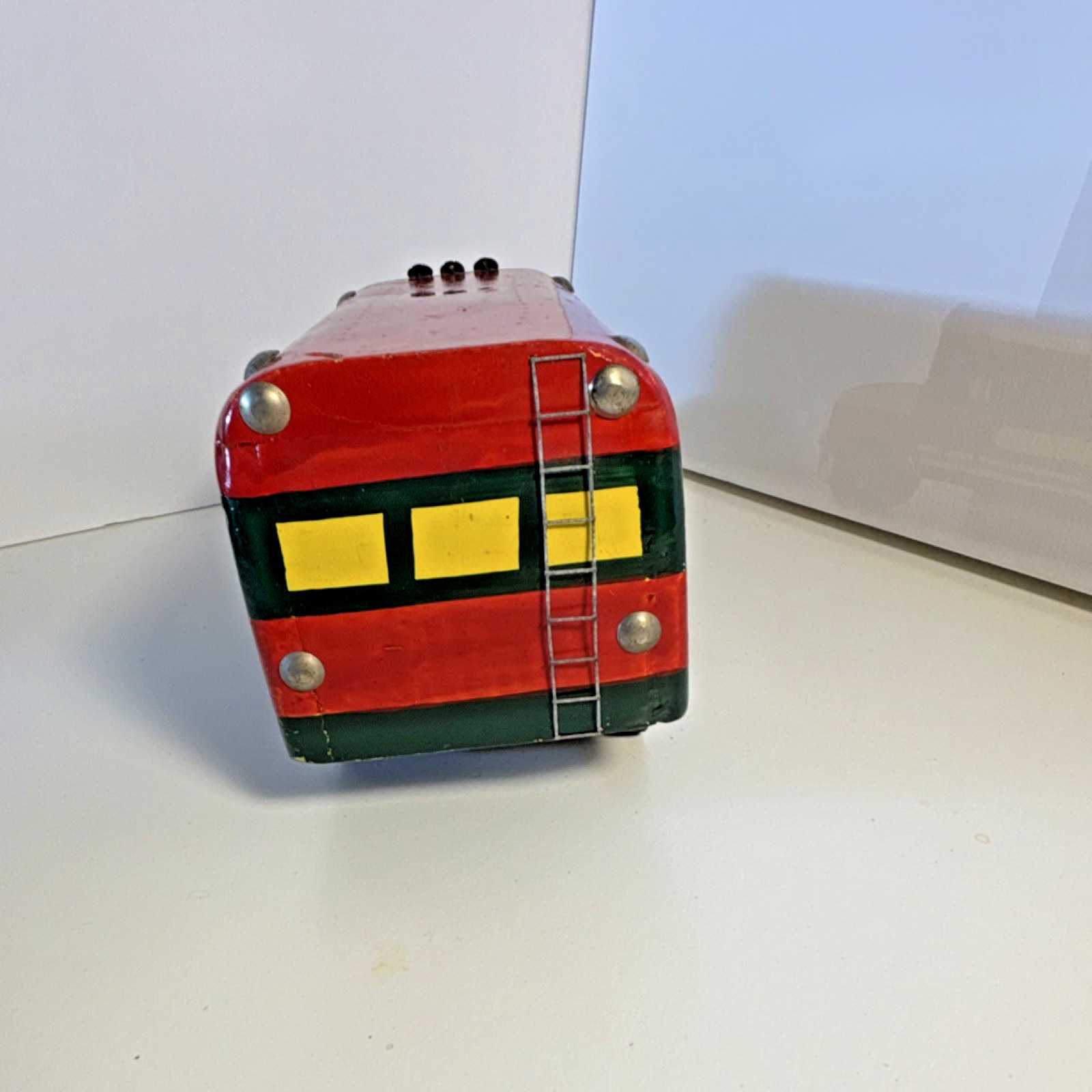 Vintage hand-painted, collectible toy replica of a Guatemalan “chicken bus”.