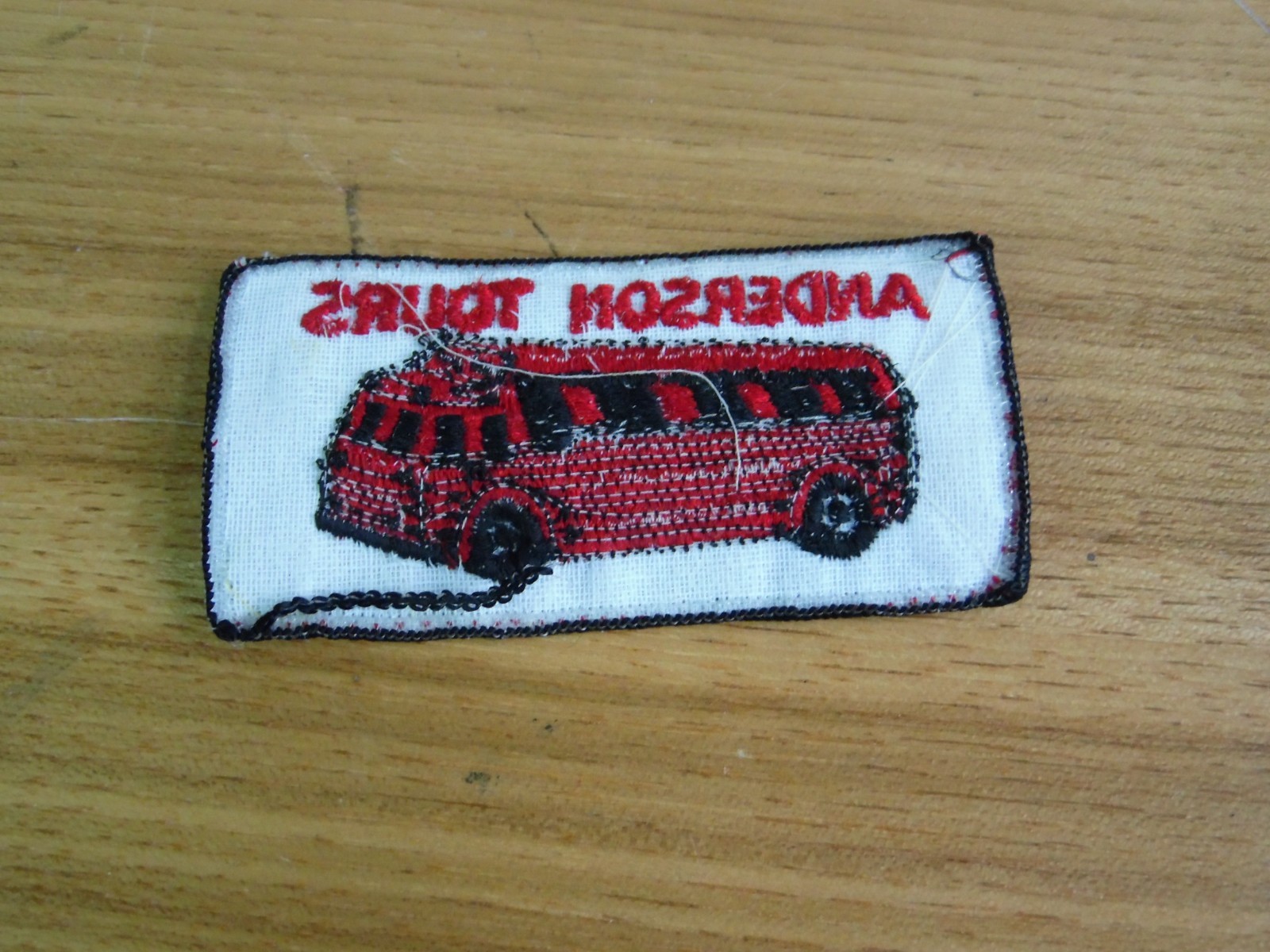 anderson tours bus tours jacket shirts sew on patch red and white 4×2