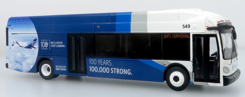 NFI Xcelsior XN40 Transit Bus: Delta 100th Anniversary 1:87 (HO) Diecast Model