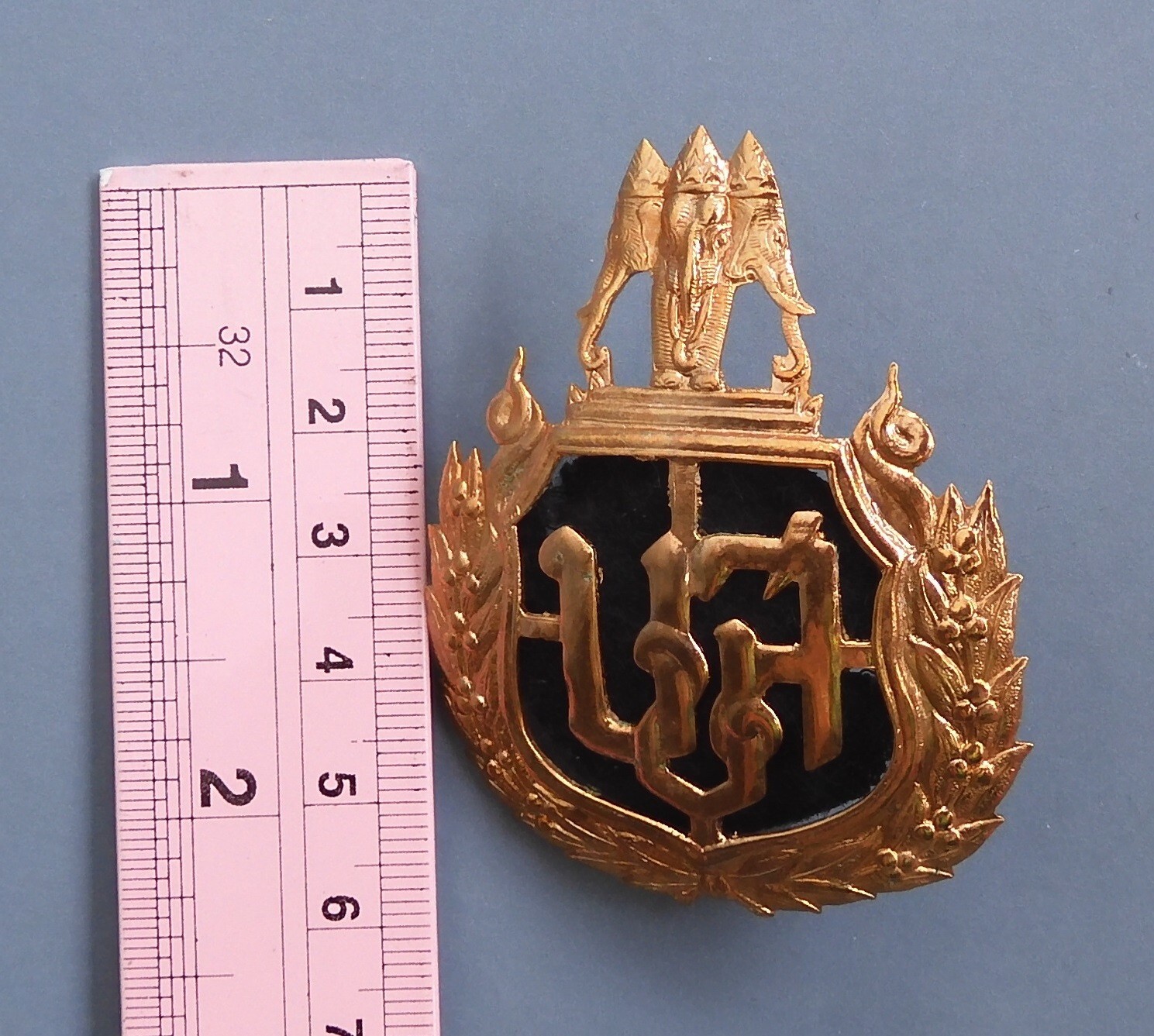 Vintage Thailand Transport Company Limited metal cap badge