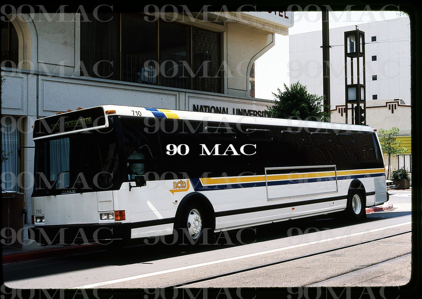 NCTD. GRUMMAN 870 BUS #710. Oceanside (CA). Original Slide 1981.
