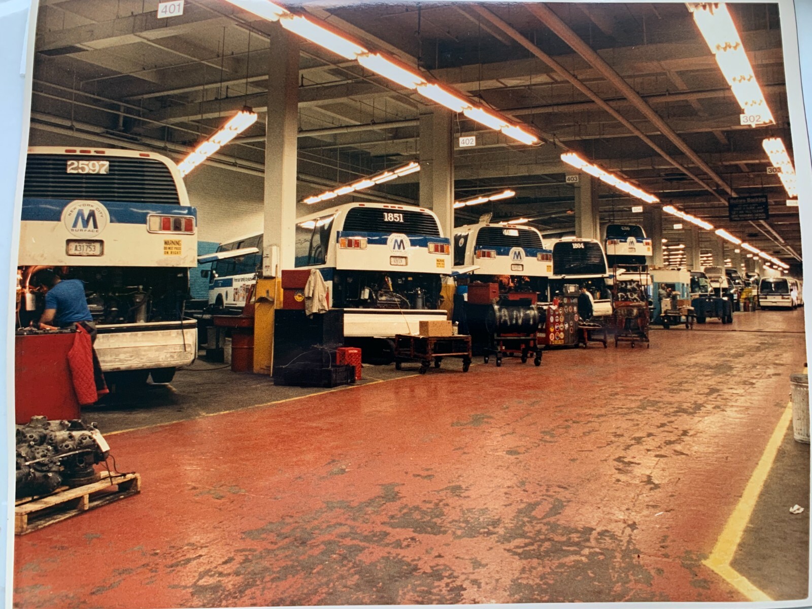 8X10 NY NYC BUS PHOTOGRAPH SURFACE TRANSIT TERMINAL GARAGE DEPOT MAINTENANCE MEN