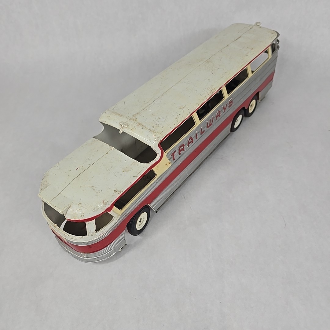 Vintage 1955 Trailways Friction Thruliner Bus Silver and Red 18″