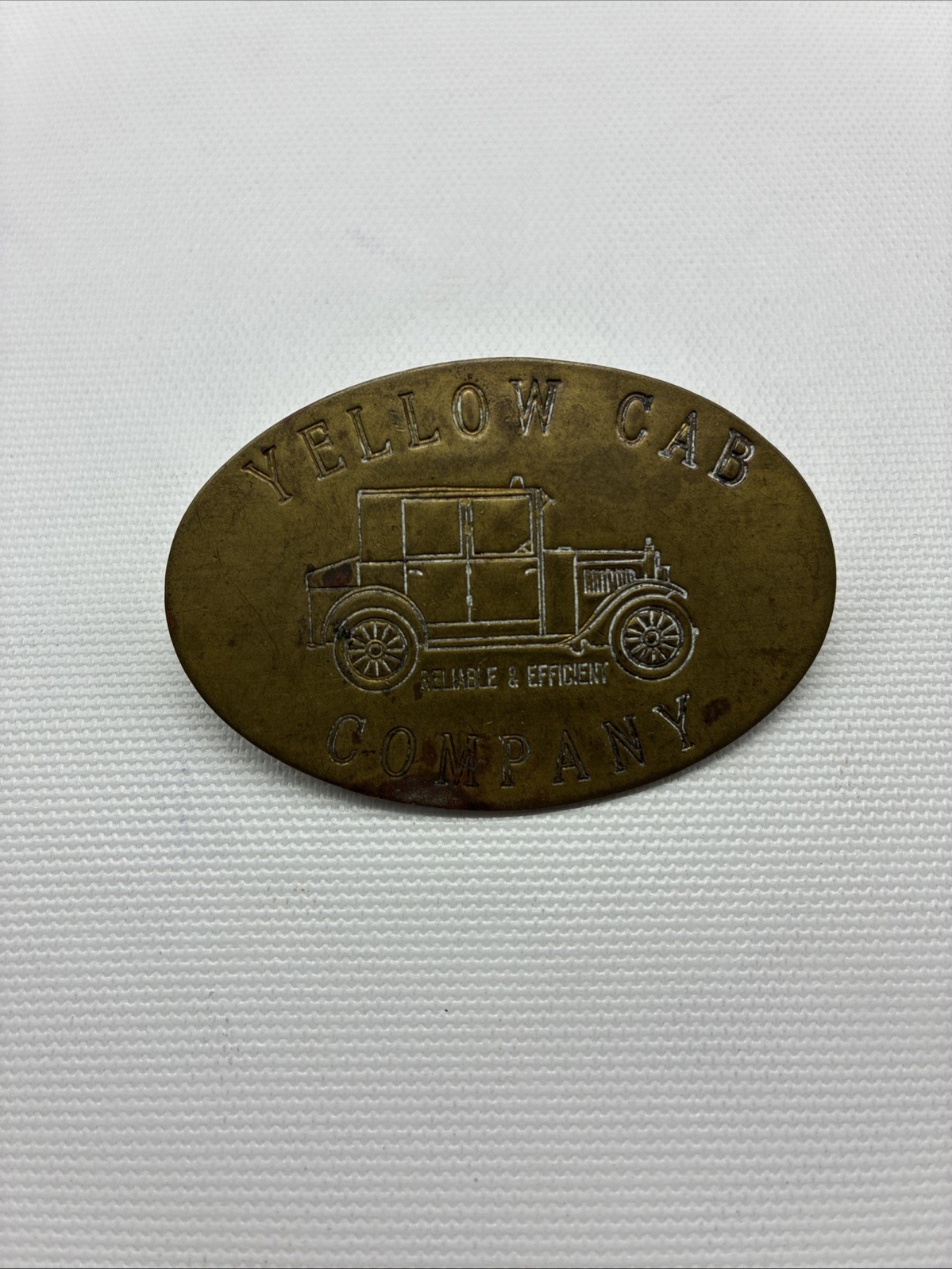 VINTAGE YELLOW CAB COMPANY “RELIABLE & EFFICIENT” BRASS BADGE/PIN