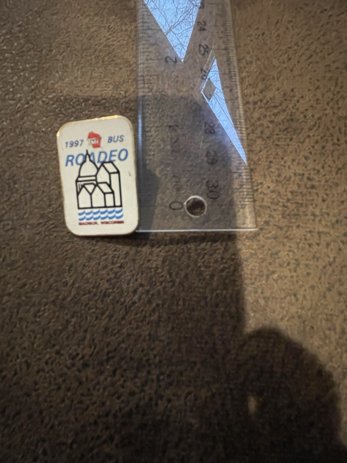 A vintage 1997 TMI Bus Roadeo pin