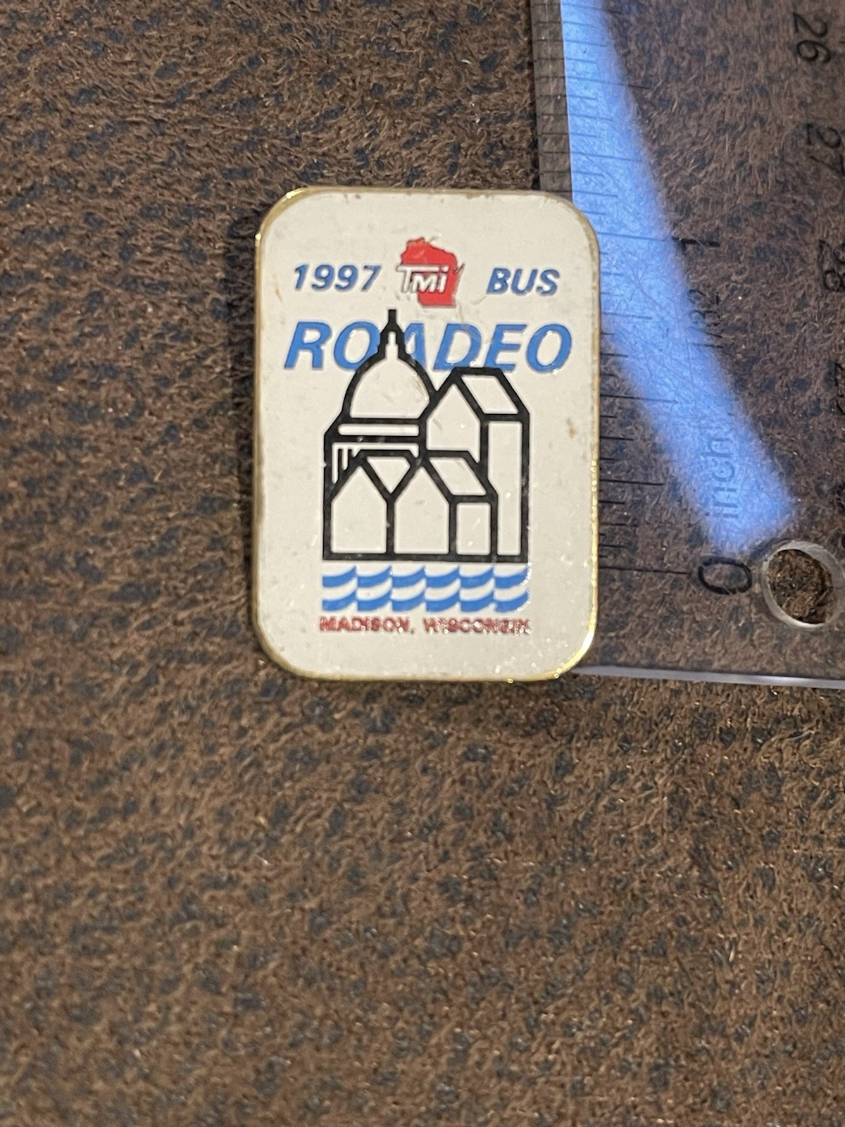 A vintage 1997 TMI Bus Roadeo pin