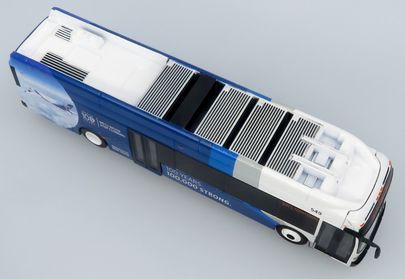 NFI Xcelsior XN40 Transit Bus: Delta 100th Anniversary 1:87 (HO) Diecast Model