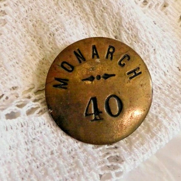 Vintage / Antique Brass Monarch 40 Badge or Pin Taxi ?