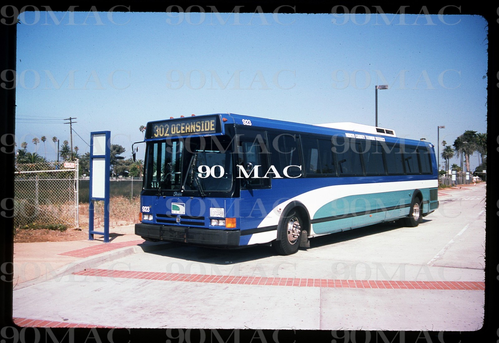 NCTD. FLXIBLE METRO BUS #923. Oceanside (CA). Original Slide 1995.