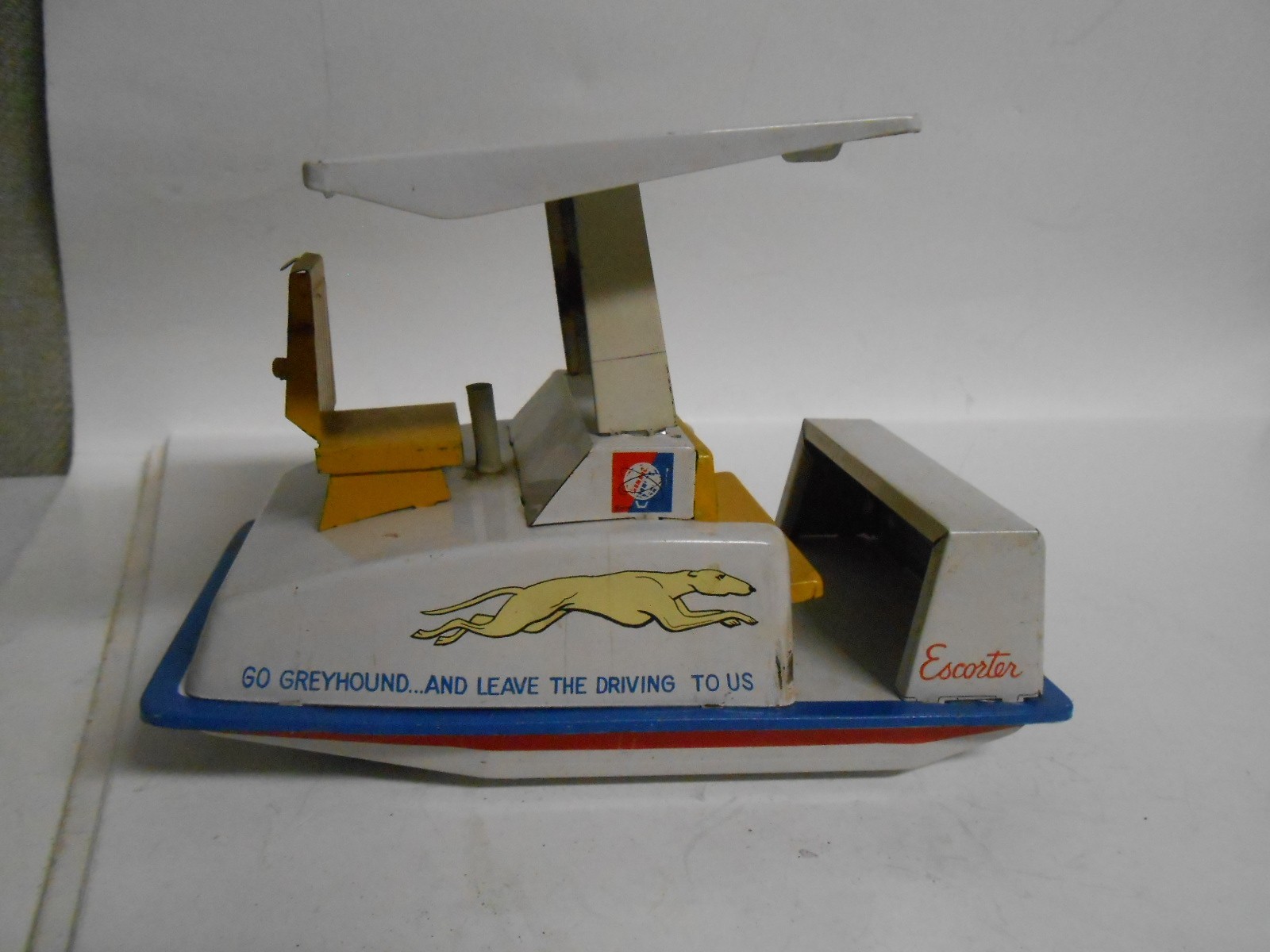 1964 New York Worlds Fair Greyhound Bus Escorter Working Friction Toy