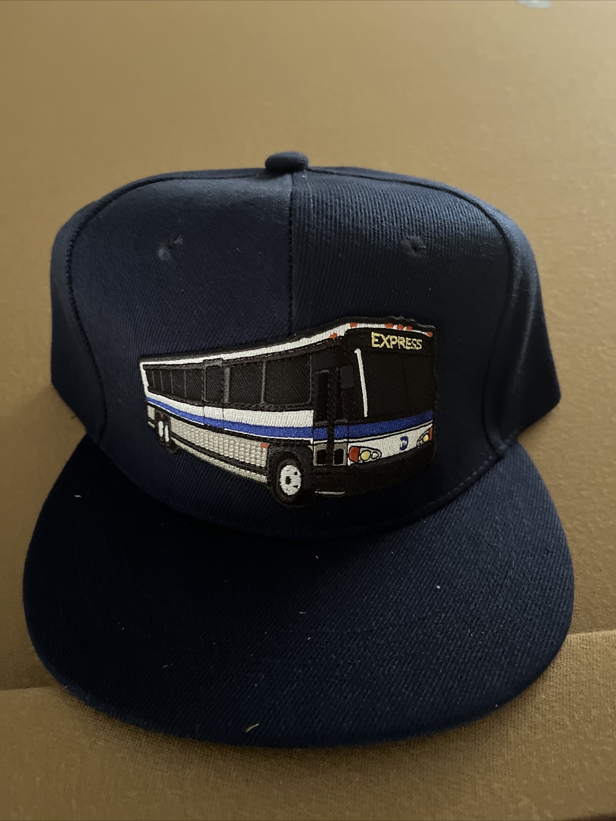NYCT MTA MCI Express Bus Snap Back Cap.