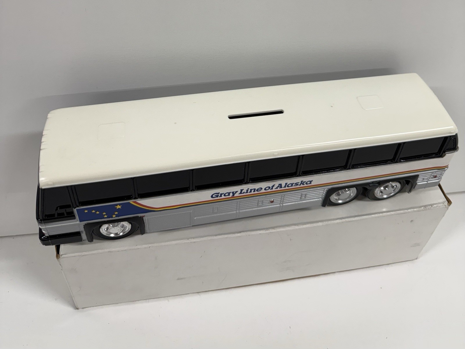 Gray Line Of Alaska Vintage Tour Bus 10″ long plastic coin bank W/ Box