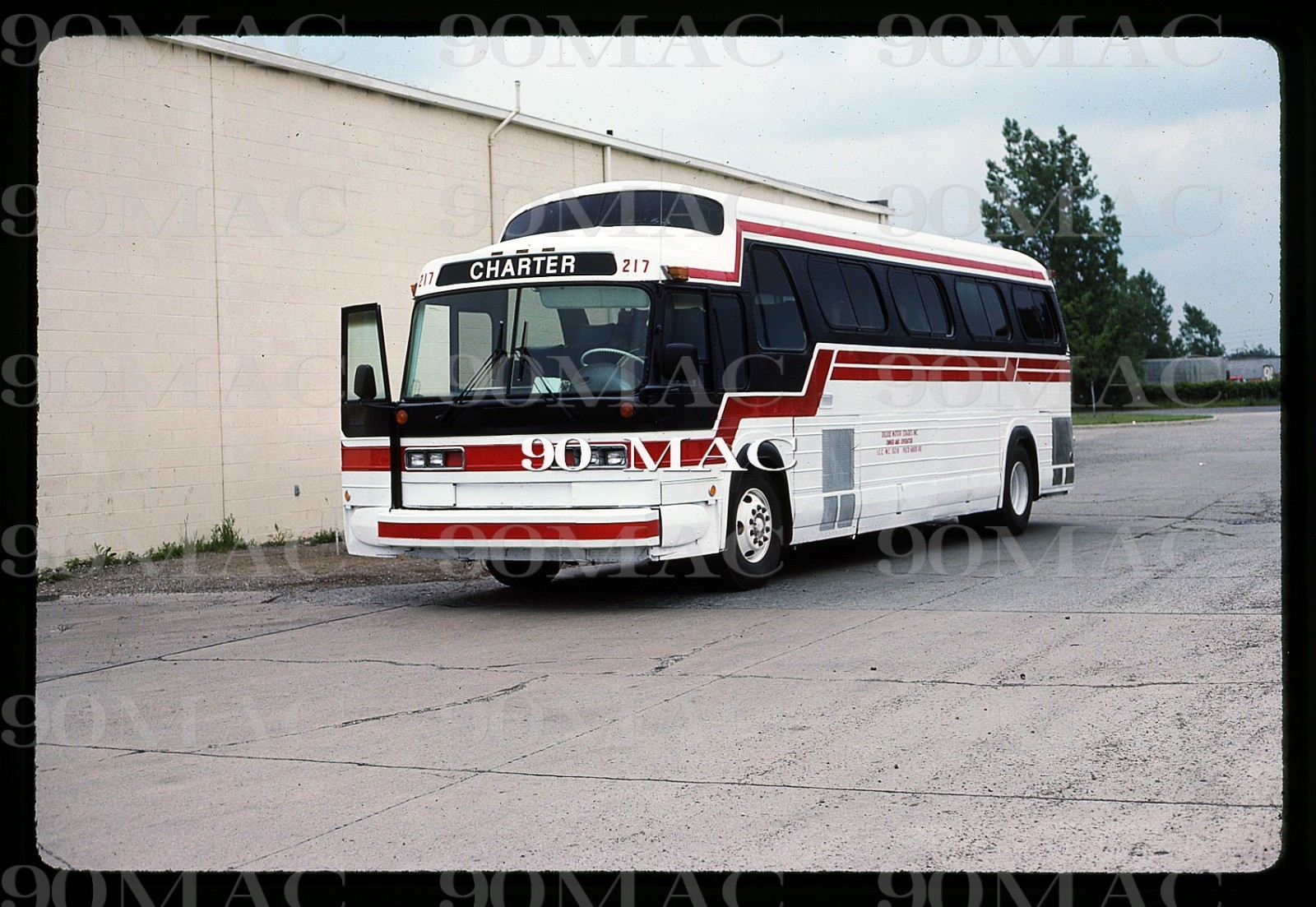 DELUXE MOTOR STAGES. GM COACH BUS #217. Holland (MI). Slide 1985.
