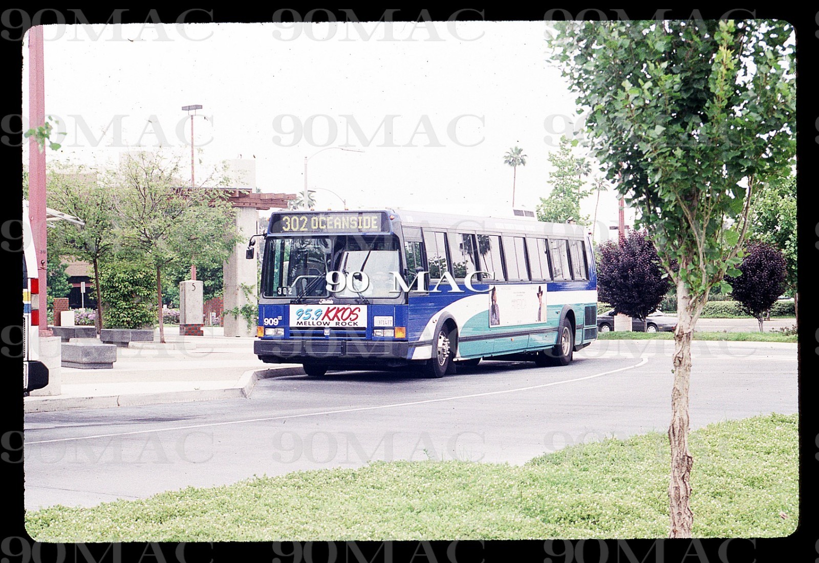 NCTD. FLXIBLE METRO BUS #909. Oceanside (CA). Original Slide 1993.