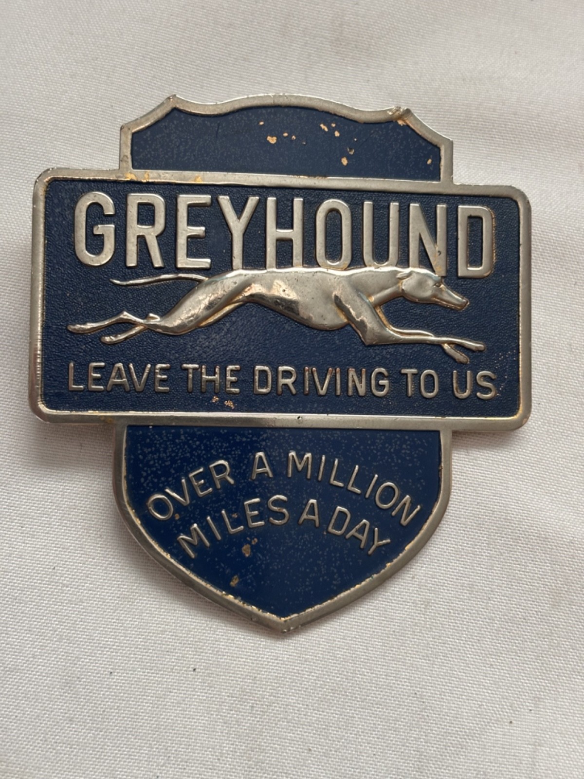 Vintage Brass Blue Enamel Greyhound Bus Drivers’ Hat Badge Gold Background