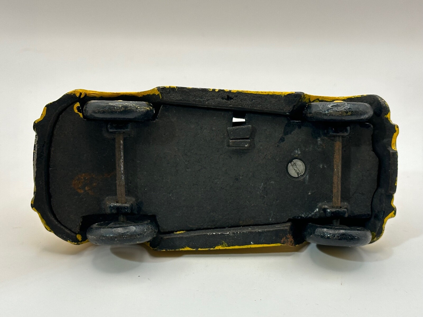 Vintage Cast Iron Taxi Driver Yellow Cab Toy with Man Driving