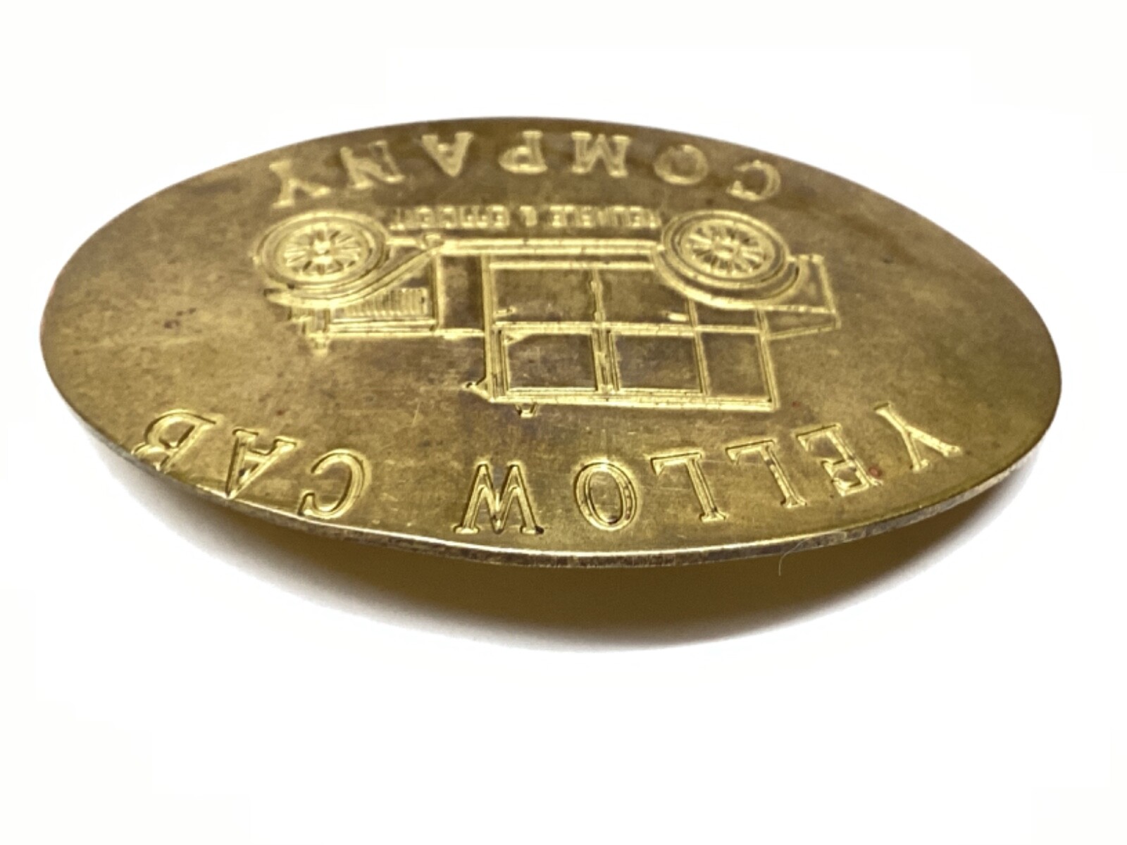 VINTAGE YELLOW CAB COMPANY “RELIABLE & EFFICIENT” BRASS BADGE/PIN.