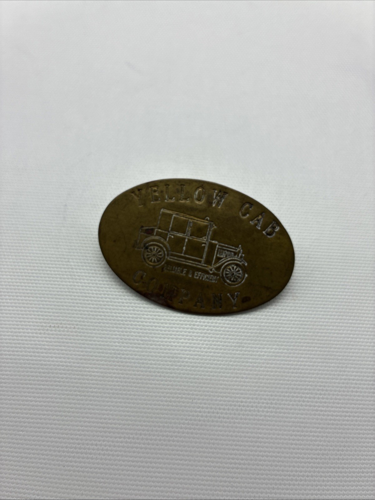 VINTAGE YELLOW CAB COMPANY “RELIABLE & EFFICIENT” BRASS BADGE/PIN