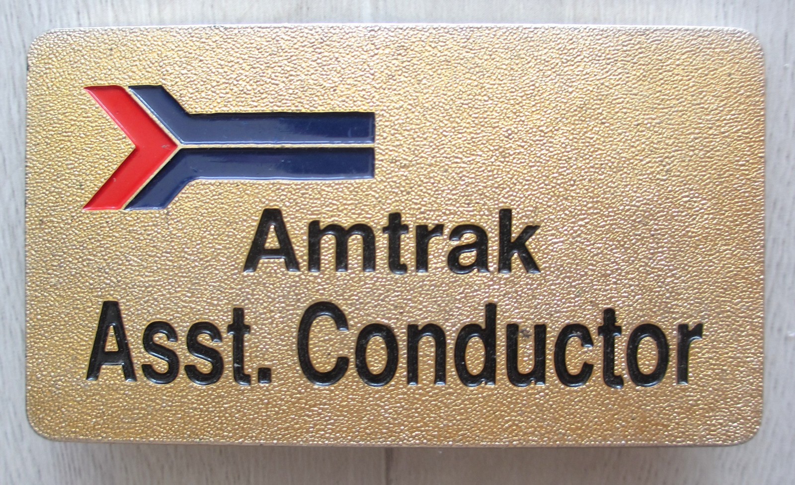 Vintage Retired Amtrak Railroad Assistant Conductor Brass Hat Badge
